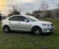Серый Мазда 3, объемом двигателя 1.6 л и пробегом 300 тыс. км за 5400 $, фото 1 на Automoto.ua