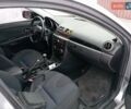 Сірий Мазда 3, об'ємом двигуна 1.6 л та пробігом 297 тис. км за 4399 $, фото 7 на Automoto.ua