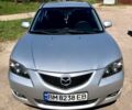 Серый Мазда 3, объемом двигателя 1.6 л и пробегом 212 тыс. км за 4300 $, фото 1 на Automoto.ua