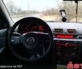 Серый Мазда 3, объемом двигателя 1.6 л и пробегом 235 тыс. км за 4200 $, фото 9 на Automoto.ua
