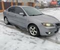 Сірий Мазда 3, об'ємом двигуна 1.6 л та пробігом 297 тис. км за 4399 $, фото 4 на Automoto.ua