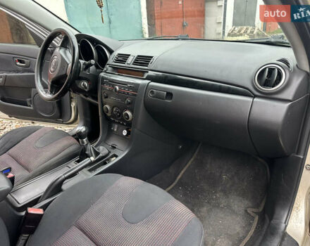 Сірий Мазда 3, об'ємом двигуна 1.6 л та пробігом 301 тис. км за 2750 $, фото 26 на Automoto.ua