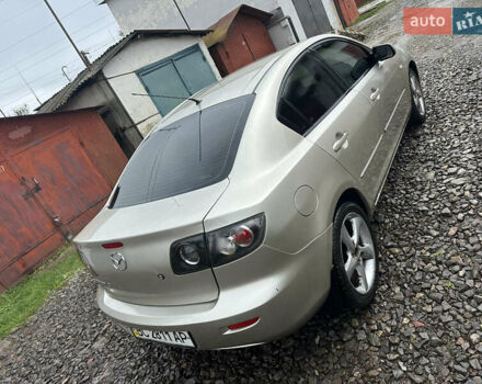 Сірий Мазда 3, об'ємом двигуна 1.6 л та пробігом 301 тис. км за 2750 $, фото 7 на Automoto.ua