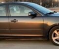 Серый Мазда 3, объемом двигателя 1.6 л и пробегом 211 тыс. км за 3700 $, фото 1 на Automoto.ua