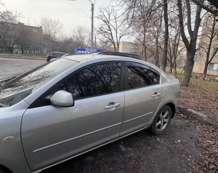 Серый Мазда 3, объемом двигателя 2 л и пробегом 268 тыс. км за 3650 $, фото 3 на Automoto.ua