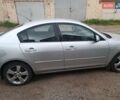 Серый Мазда 3, объемом двигателя 2 л и пробегом 300 тыс. км за 4500 $, фото 2 на Automoto.ua