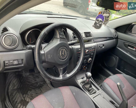 Серый Мазда 3, объемом двигателя 1.6 л и пробегом 260 тыс. км за 5100 $, фото 7 на Automoto.ua