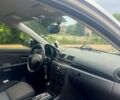 Сірий Мазда 3, об'ємом двигуна 2 л та пробігом 213 тис. км за 4200 $, фото 3 на Automoto.ua