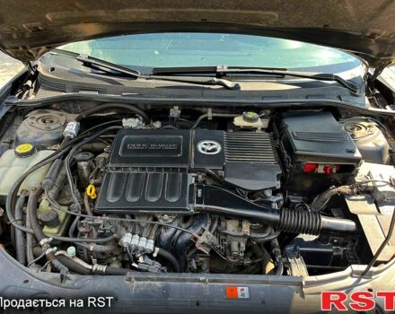 Серый Мазда 3, объемом двигателя 1.6 л и пробегом 203 тыс. км за 4500 $, фото 6 на Automoto.ua