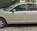 Серый Мазда 3, объемом двигателя 1.6 л и пробегом 273 тыс. км за 4500 $, фото 1 на Automoto.ua