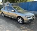 Серый Мазда 3, объемом двигателя 1.6 л и пробегом 270 тыс. км за 5000 $, фото 1 на Automoto.ua