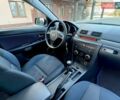 Серый Мазда 3, объемом двигателя 2 л и пробегом 235 тыс. км за 3999 $, фото 28 на Automoto.ua