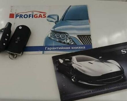 Серый Мазда 3, объемом двигателя 1.6 л и пробегом 301 тыс. км за 5400 $, фото 25 на Automoto.ua