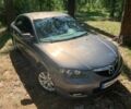 Серый Мазда 3, объемом двигателя 1.6 л и пробегом 245 тыс. км за 5500 $, фото 1 на Automoto.ua