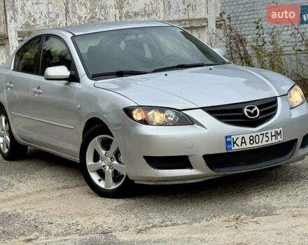 Серый Мазда 3, объемом двигателя 2 л и пробегом 214 тыс. км за 4450 $, фото 1 на Automoto.ua