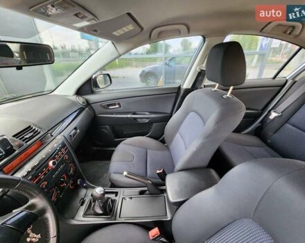 Серый Мазда 3, объемом двигателя 1.6 л и пробегом 175 тыс. км за 4950 $, фото 51 на Automoto.ua