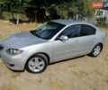 Серый Мазда 3, объемом двигателя 1.6 л и пробегом 188 тыс. км за 4980 $, фото 1 на Automoto.ua