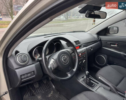 Серый Мазда 3, объемом двигателя 1.6 л и пробегом 165 тыс. км за 5000 $, фото 10 на Automoto.ua