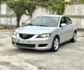 Серый Мазда 3, объемом двигателя 2 л и пробегом 216 тыс. км за 4400 $, фото 1 на Automoto.ua