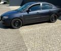 Серый Мазда 3, объемом двигателя 1.6 л и пробегом 203 тыс. км за 4500 $, фото 1 на Automoto.ua