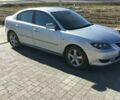 Серый Мазда 3, объемом двигателя 1.6 л и пробегом 250 тыс. км за 5500 $, фото 1 на Automoto.ua