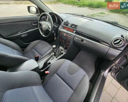 Серый Мазда 3, объемом двигателя 1.6 л и пробегом 175 тыс. км за 4950 $, фото 31 на Automoto.ua
