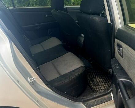 Сірий Мазда 3, об'ємом двигуна 2 л та пробігом 213 тис. км за 4200 $, фото 4 на Automoto.ua