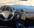 Серый Мазда 3, объемом двигателя 1.6 л и пробегом 224 тыс. км за 4700 $, фото 6 на Automoto.ua