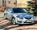 Серый Мазда 3, объемом двигателя 2 л и пробегом 235 тыс. км за 3999 $, фото 3 на Automoto.ua