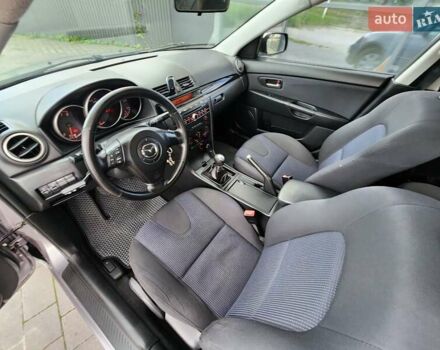 Серый Мазда 3, объемом двигателя 1.6 л и пробегом 175 тыс. км за 4950 $, фото 46 на Automoto.ua