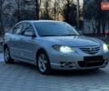 Сірий Мазда 3, об'ємом двигуна 2 л та пробігом 206 тис. км за 2999 $, фото 1 на Automoto.ua