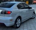 Сірий Мазда 3, об'ємом двигуна 2 л та пробігом 206 тис. км за 2999 $, фото 1 на Automoto.ua