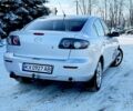 Сірий Мазда 3, об'ємом двигуна 2 л та пробігом 235 тис. км за 4100 $, фото 2 на Automoto.ua