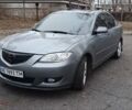 Серый Мазда 3, объемом двигателя 1.6 л и пробегом 301 тыс. км за 5400 $, фото 3 на Automoto.ua
