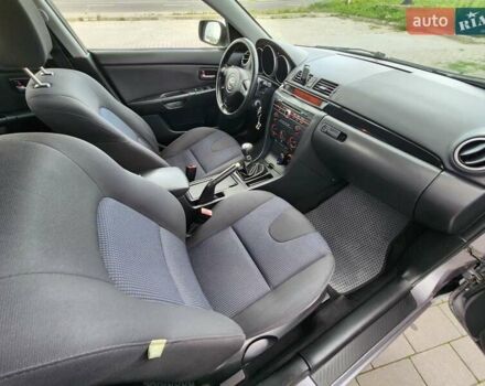 Серый Мазда 3, объемом двигателя 1.6 л и пробегом 175 тыс. км за 4950 $, фото 27 на Automoto.ua