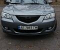 Серый Мазда 3, объемом двигателя 1.6 л и пробегом 301 тыс. км за 5400 $, фото 1 на Automoto.ua