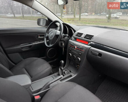 Серый Мазда 3, объемом двигателя 1.6 л и пробегом 165 тыс. км за 5000 $, фото 13 на Automoto.ua