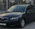 Серый Мазда 3, объемом двигателя 2 л и пробегом 220 тыс. км за 5000 $, фото 1 на Automoto.ua