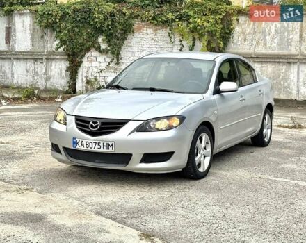 Серый Мазда 3, объемом двигателя 2 л и пробегом 214 тыс. км за 4450 $, фото 3 на Automoto.ua
