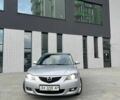 Серый Мазда 3, объемом двигателя 2 л и пробегом 184 тыс. км за 4200 $, фото 1 на Automoto.ua