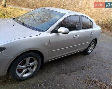 Серый Мазда 3, объемом двигателя 1.6 л и пробегом 383 тыс. км за 3400 $, фото 1 на Automoto.ua