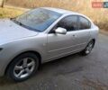 Серый Мазда 3, объемом двигателя 1.6 л и пробегом 383 тыс. км за 3400 $, фото 1 на Automoto.ua