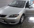 Сірий Мазда 3, об'ємом двигуна 2 л та пробігом 256 тис. км за 4900 $, фото 1 на Automoto.ua