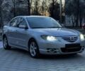 Сірий Мазда 3, об'ємом двигуна 2 л та пробігом 205 тис. км за 4350 $, фото 1 на Automoto.ua