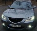 Серый Мазда 3, объемом двигателя 1.6 л и пробегом 301 тыс. км за 5400 $, фото 2 на Automoto.ua