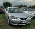 Серый Мазда 3, объемом двигателя 1.6 л и пробегом 305 тыс. км за 3900 $, фото 1 на Automoto.ua