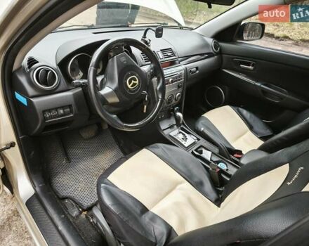 Серый Мазда 3, объемом двигателя 1.6 л и пробегом 297 тыс. км за 4350 $, фото 7 на Automoto.ua