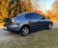 Сірий Мазда 3, об'ємом двигуна 2 л та пробігом 260 тис. км за 4900 $, фото 4 на Automoto.ua