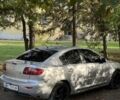 Серый Мазда 3, объемом двигателя 1.6 л и пробегом 211 тыс. км за 2760 $, фото 3 на Automoto.ua