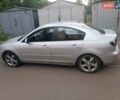 Серый Мазда 3, объемом двигателя 2 л и пробегом 300 тыс. км за 4500 $, фото 3 на Automoto.ua